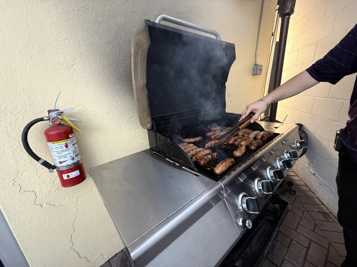 Patio grill with sausages